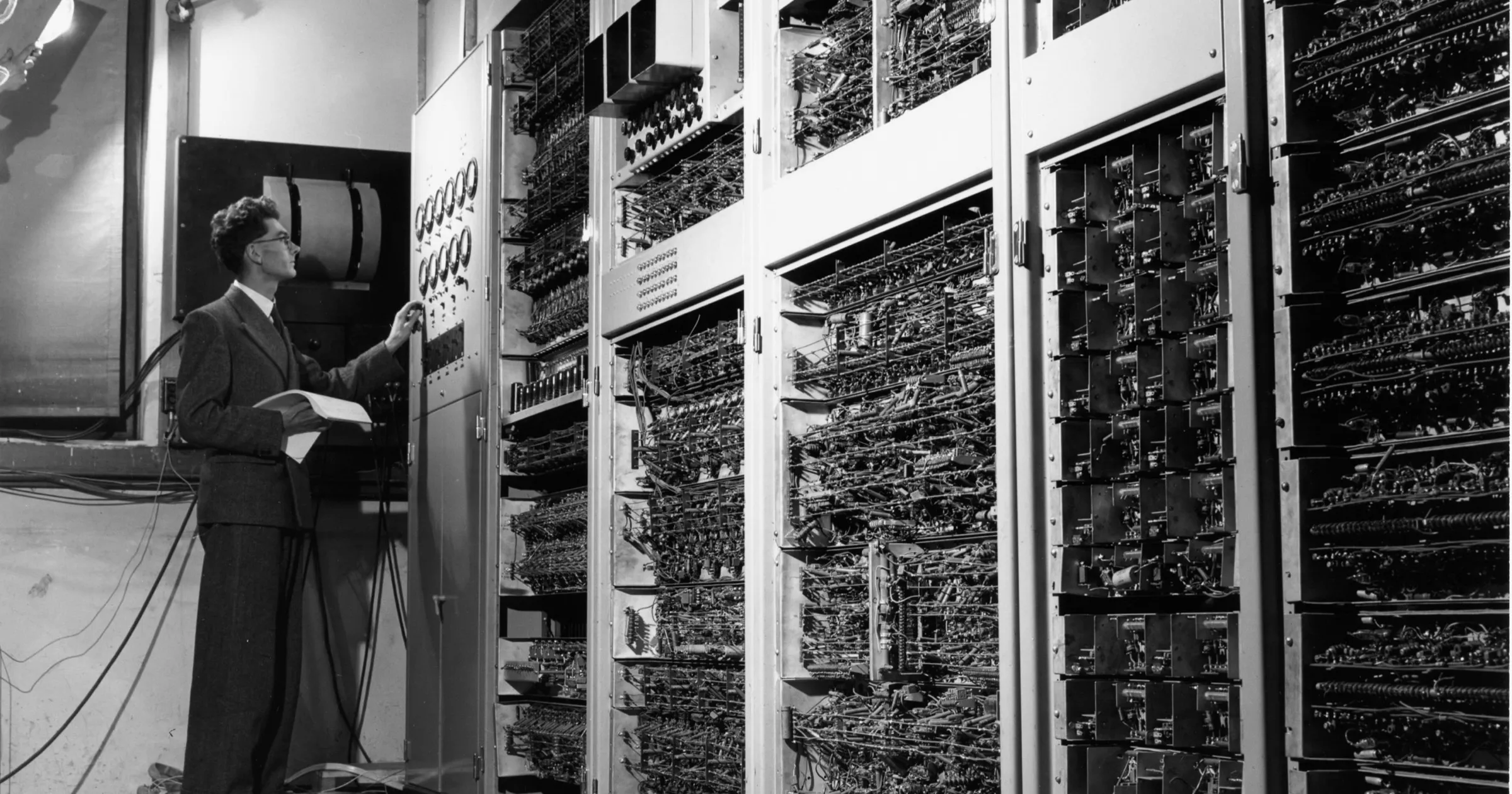 Trevor Pearcey operating the CSIR Mk1, one of the world's first digital computers, in 1952